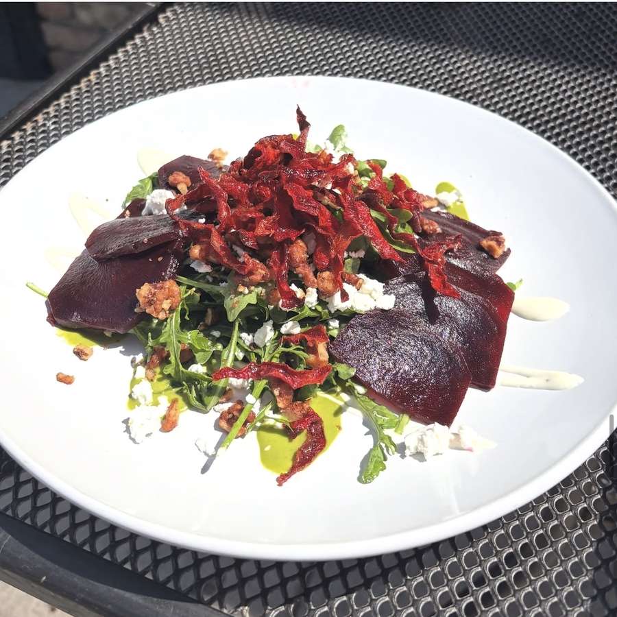Beet salad on the beer garden patio at Spoko Lincoln Park